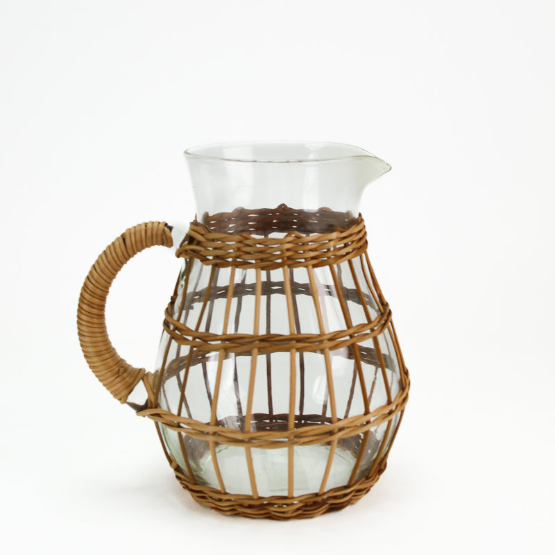 Glass salad bowl with woven rattan holder